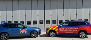 Devon air ambulance critical care cars by aircraft hanger