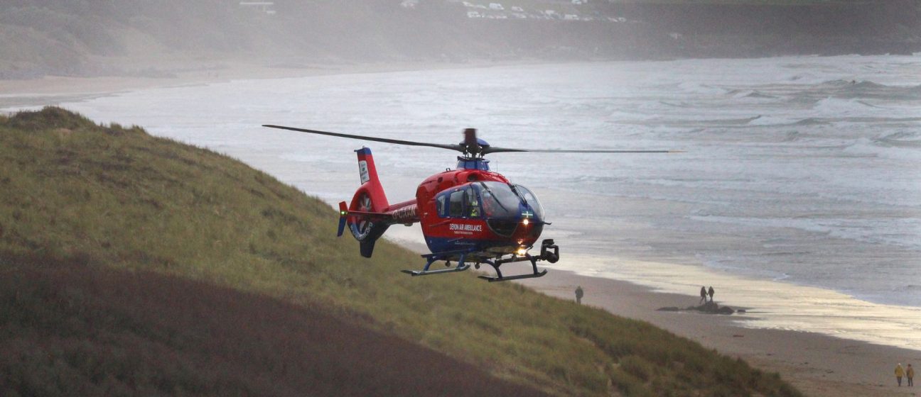 DAA aircraft in flying across beach setting