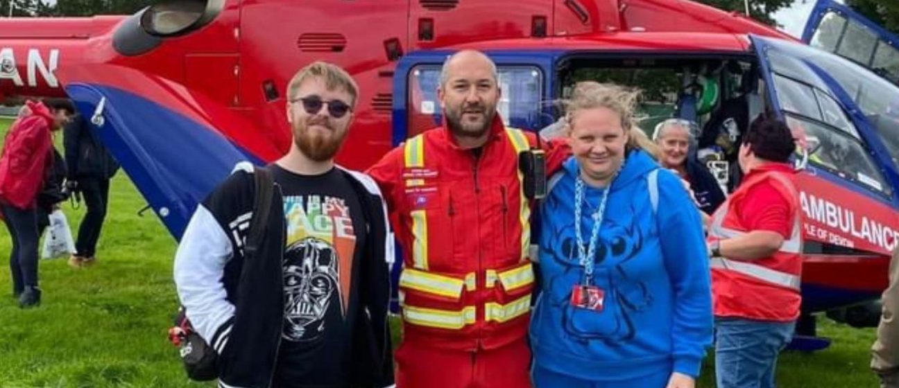 Volunteers with a crew member