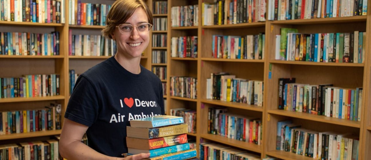 Volunteer with books