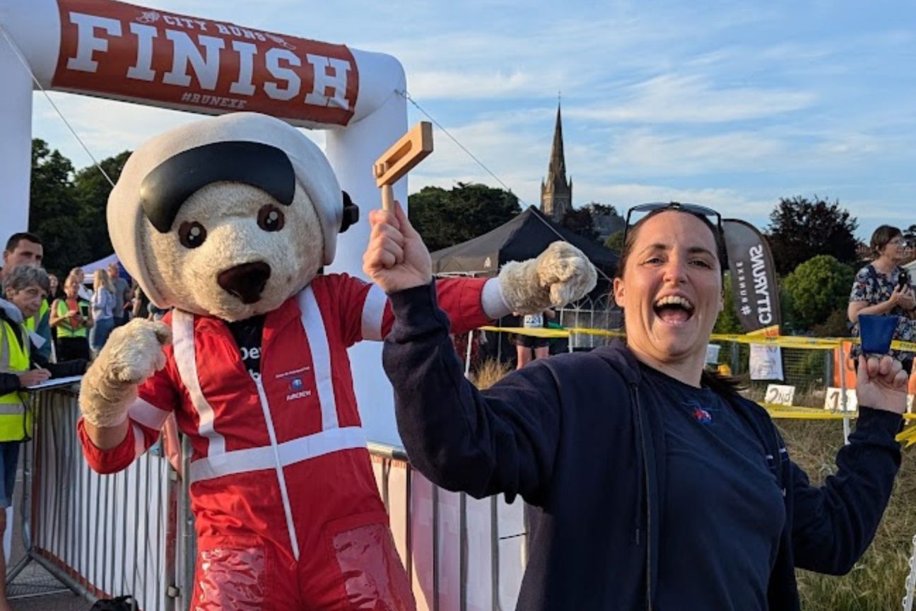 Ambrose bear and paramedic Laura at a marathon fundraising event