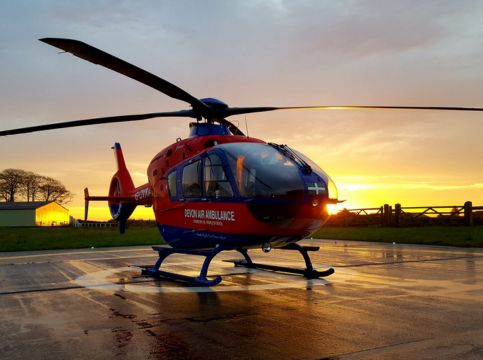 DAA aircraft against sunset on helipad