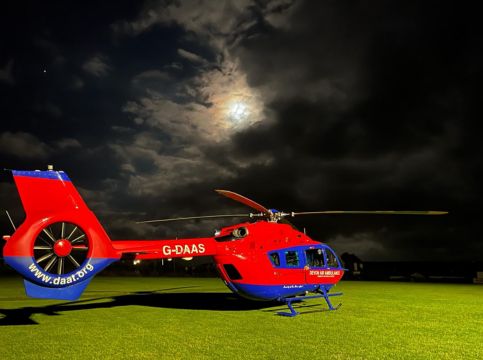 Aircraft at night on sports field