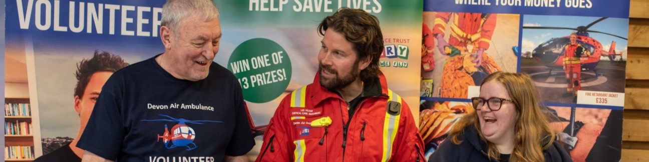 Paramedic, Lee Hilton, with two of our volunteers