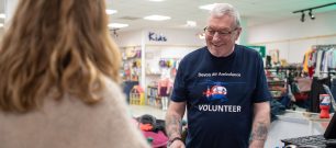 A happy retail volunteer